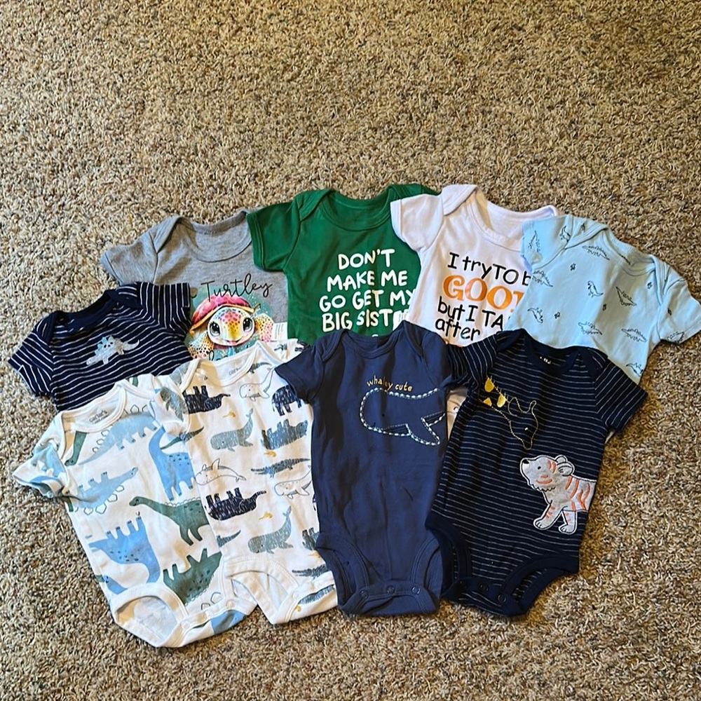 Lot of 9 0-3 month Onesies.